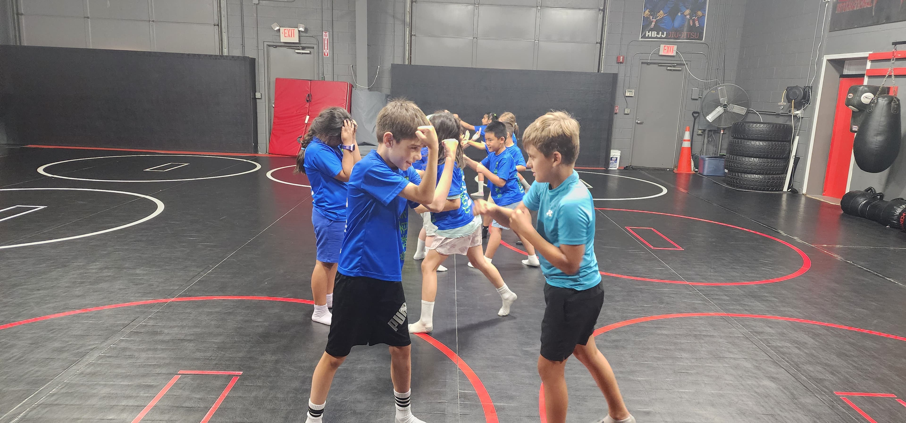 Campers practicing on the mats