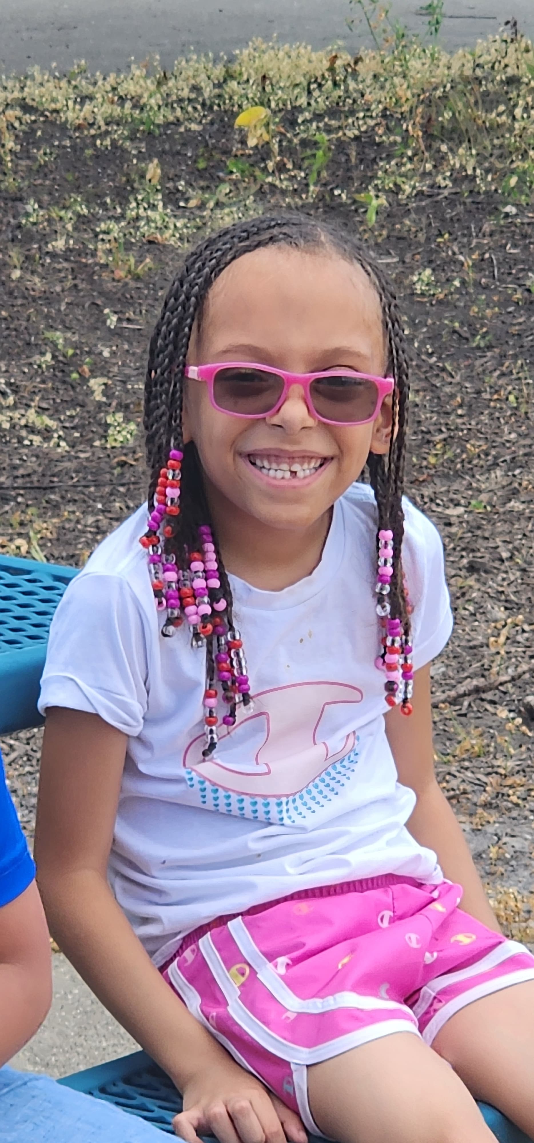 Smiling camper with sunglasses