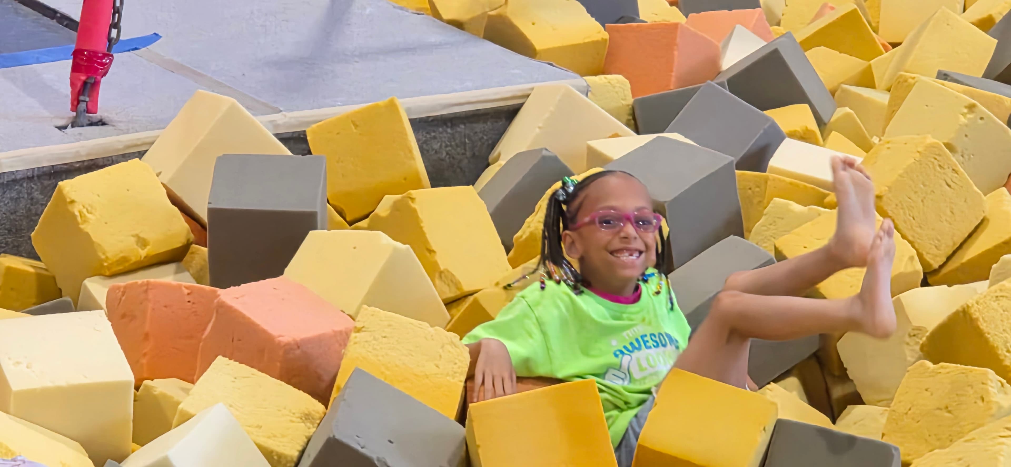 Camper relaxing in a foam pit