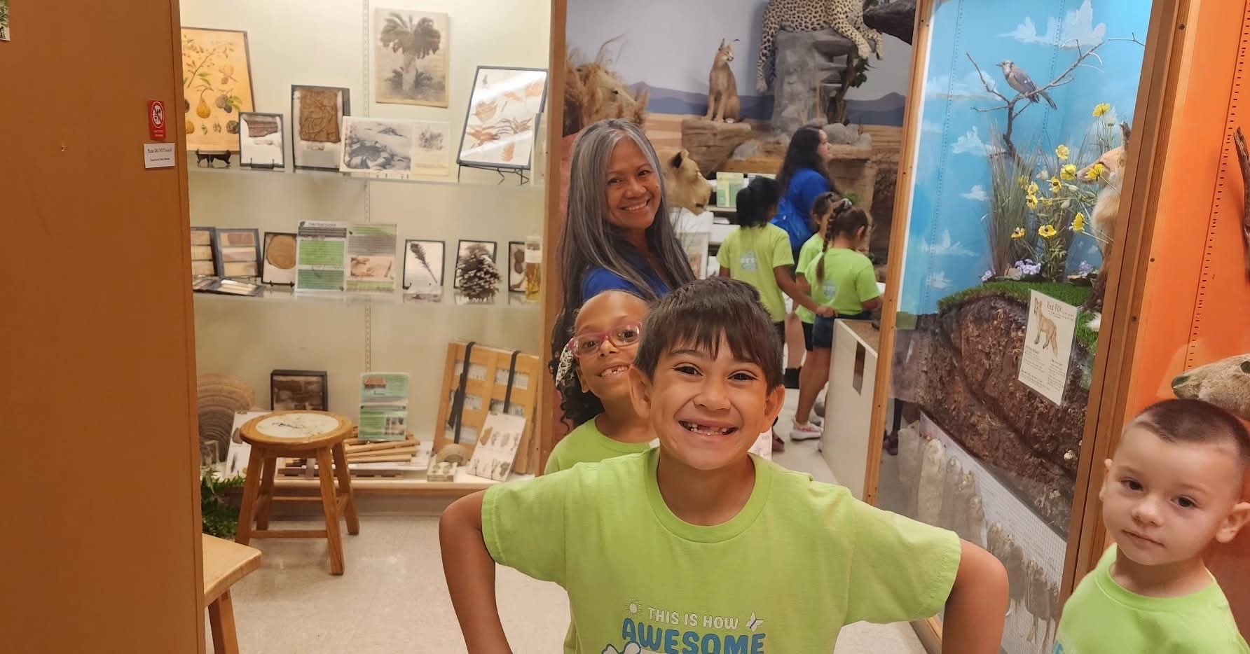 Campers exploring a museum